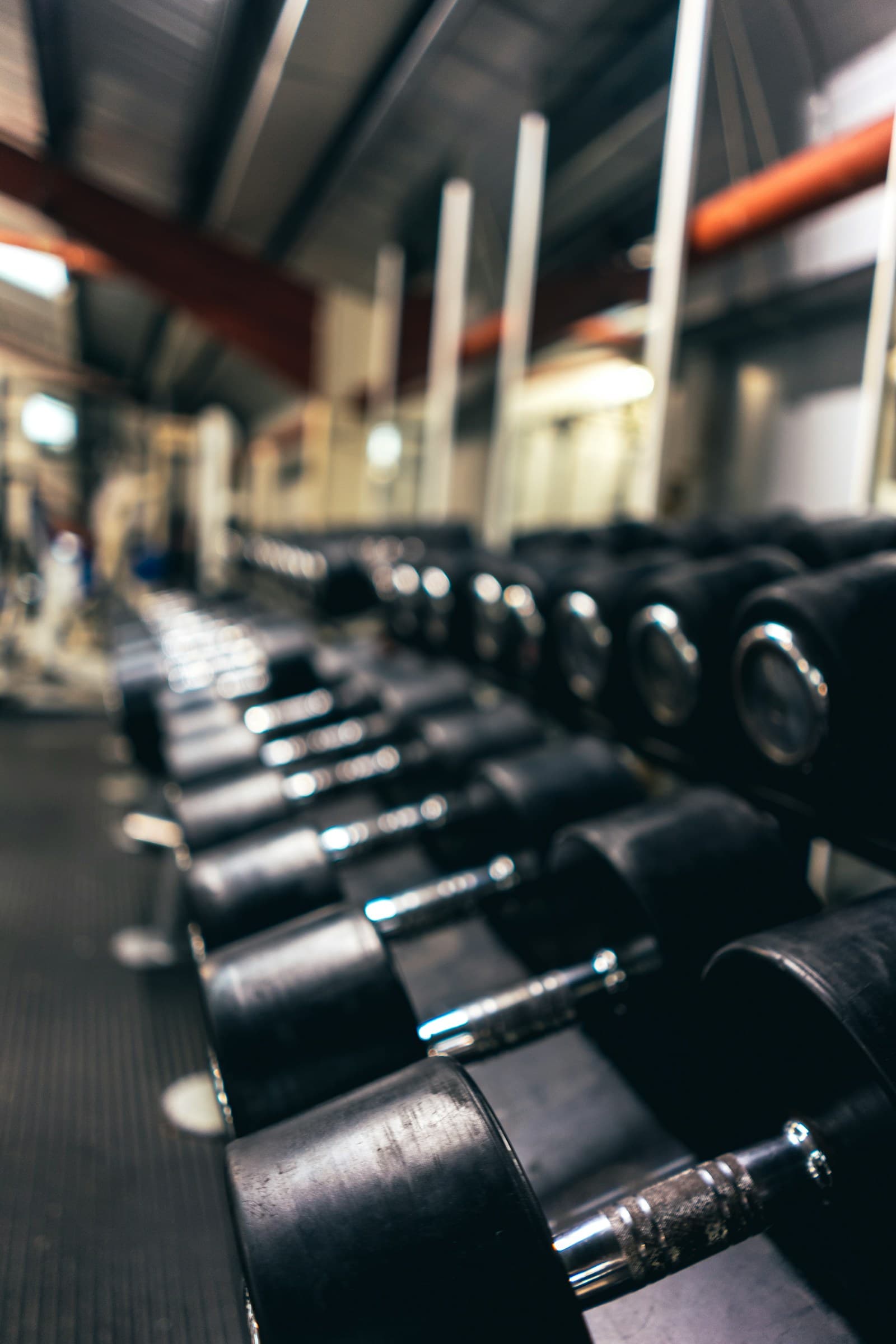 Dumbbells racked in a gym